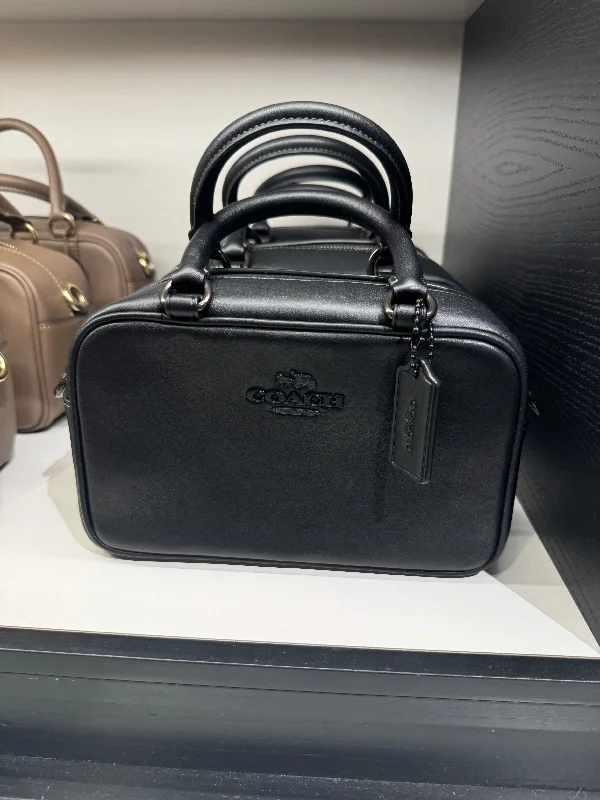 Coach Rogue bags with a monogram - embossed leather surfaceCoach Satchel Crossbody In Black Cooper (Pre-Order)