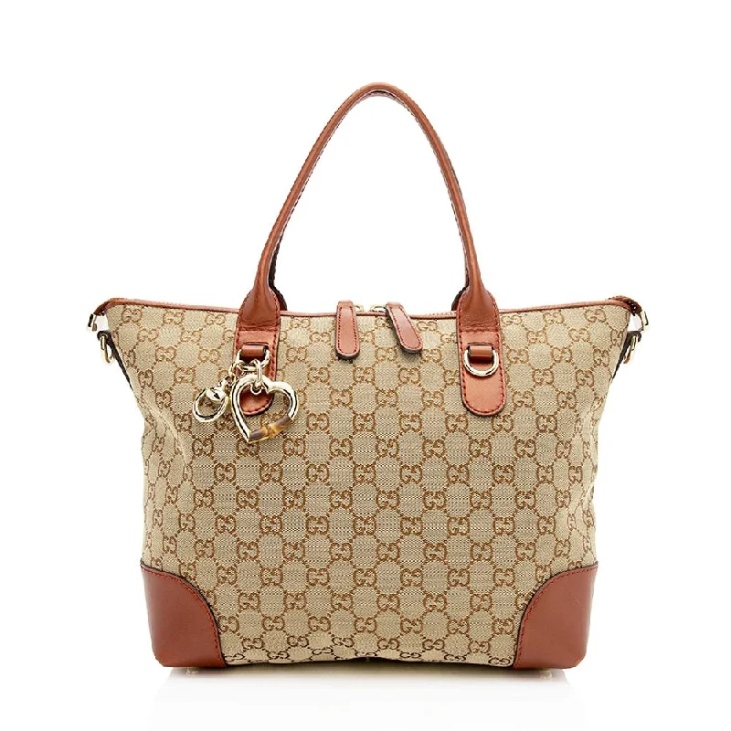 Gucci tote bags for women with a spacious interiorGucci GG Canvas Heart Bit Medium Tote (SHF-12715)