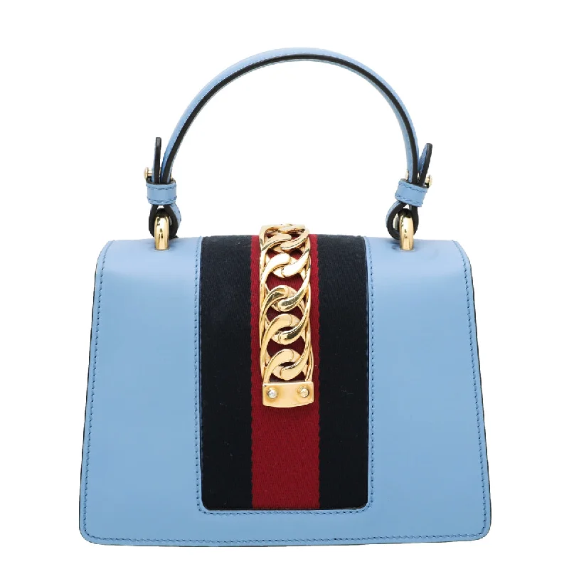 Gucci crossbody bags for women with adjustable leather strapsGucci Blue Sylvie Top Handle Mini Bag