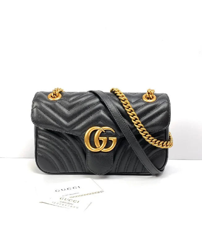 Ladies Gucci Dionysus bags in a pastel colorGucci GG Marmont small cross-body bag black