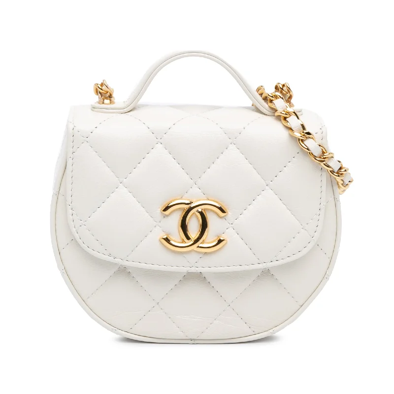 Balenciaga Le Cagole large size with tassel - trimmed cornersWhite Chanel Mini CC Quilted Aged Calfskin Top Handle Clutch with Chain