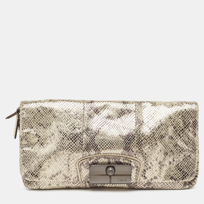 Coach backpacks with a padded laptop sleeve for travel and workMetallic Silver/Black Python Embossed Leather Flap Clutch