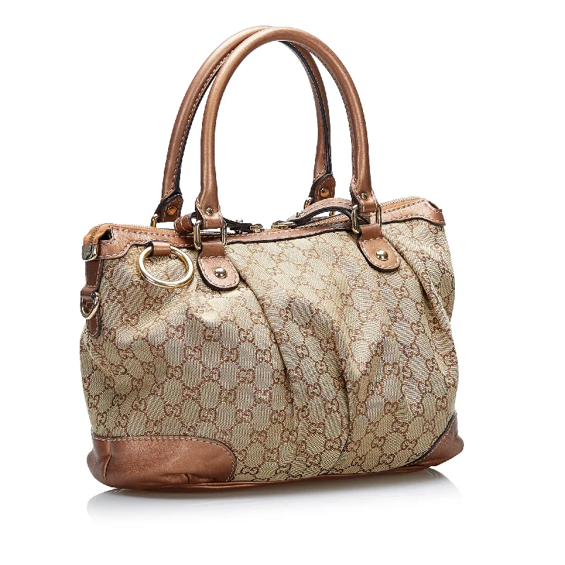 Gucci Marmont bags for women with quilted leather exteriorsGucci GG Canvas Sukey Satchel (SHG-tzQVlR)