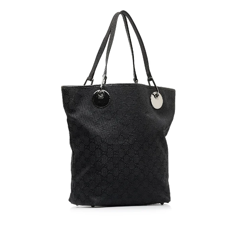 Ladies Gucci handbags with a detachable coin purse insideBlack Gucci GG Canvas Eclipse Tote Bag