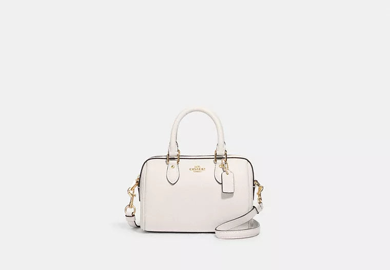 Ladies Coach Tabby bags with gold - toned hardware for a touch of luxuryCoach Mini Rowan Crossbody Chalk