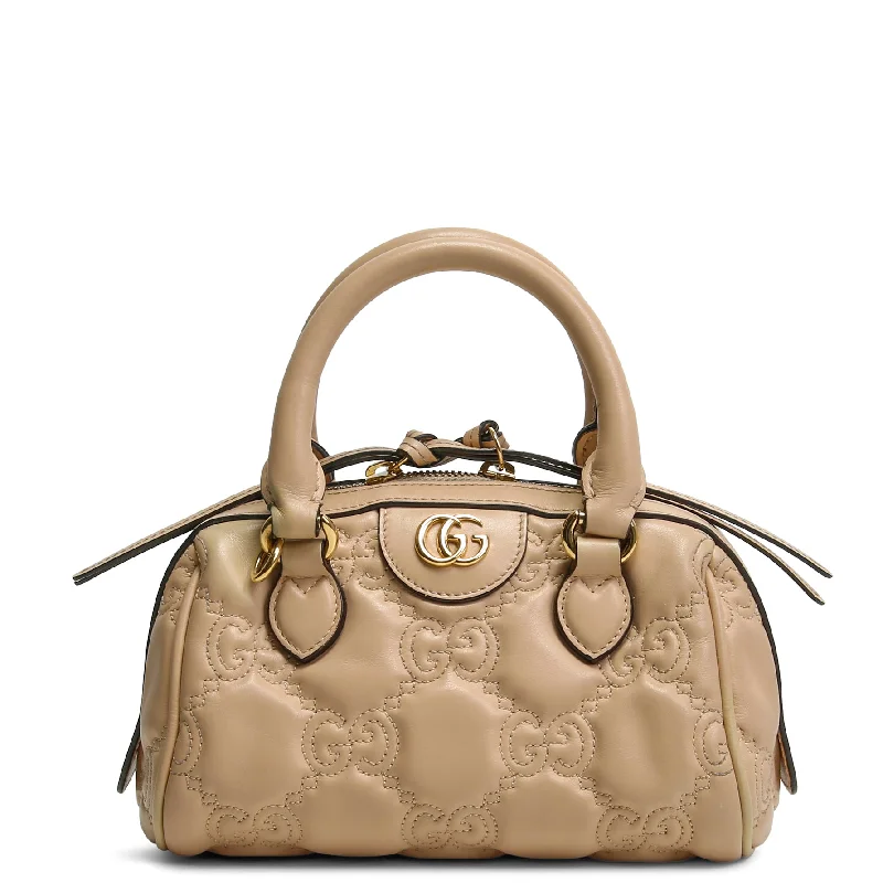 Gucci Marmont bags for women with a contrast - colored interiorGUCCI GG Matelasse Handbag - Neutral