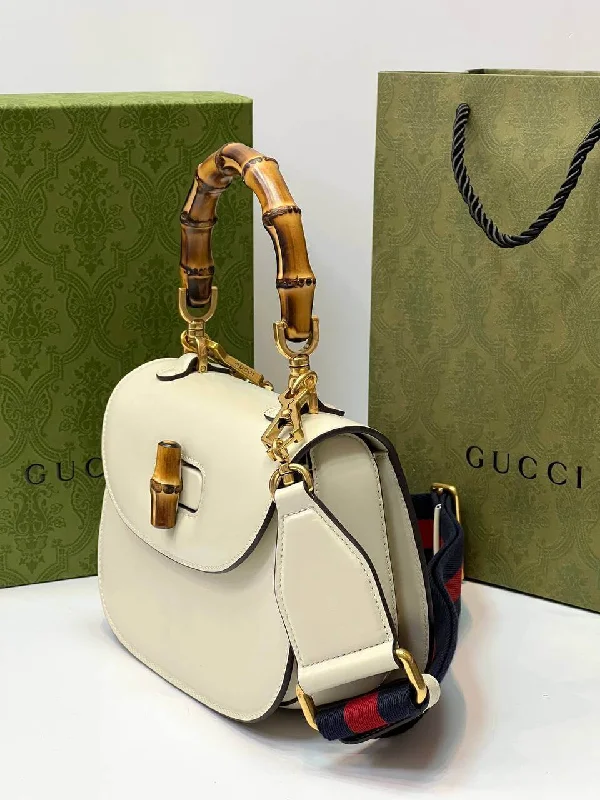 Women Gucci tote bags in GG Supreme canvas for a branded feelGucci Bamboo 1947 mini top handle bag white