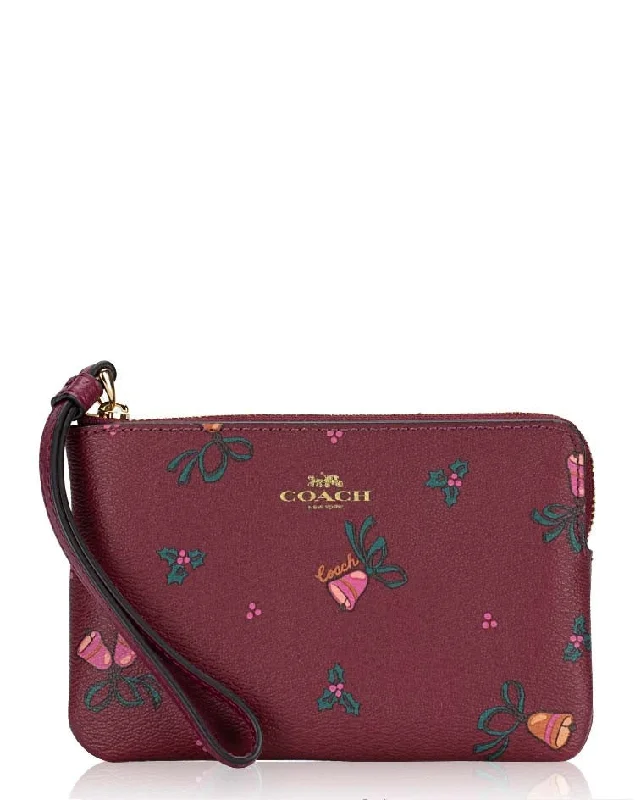 Coach bags with a detachable mirror inside for quick touch - upsCoach Holiday Bells Print Corner Zip Wristlet