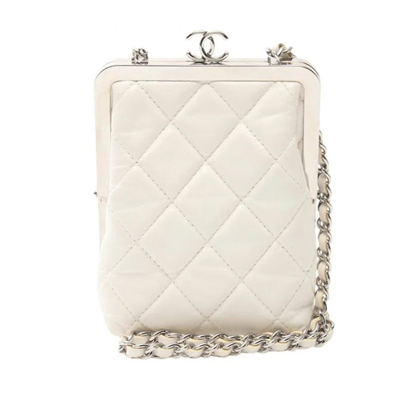 Balenciaga City bag with patchwork of different leathersWhite Chanel CC Quilted Lambskin Evening Clutch