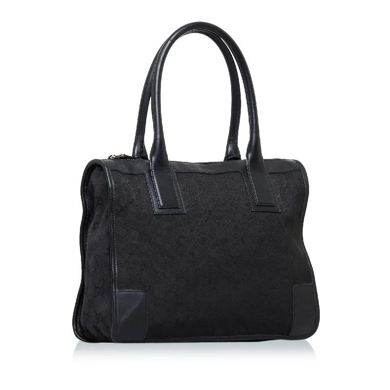 Gucci tote bags for women with a printed Gucci logoBlack Gucci GG Canvas Tote