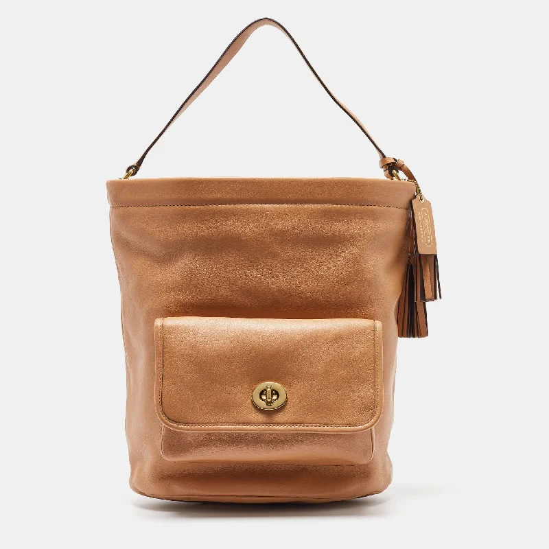 Coach backpacks with a sleek, modern design for a stylish lookBeige Leather Legacy Tassel Bucket Bag