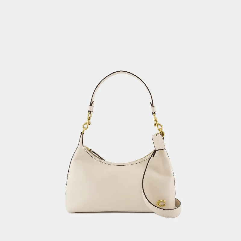 Coach handbags with a perforated leather detail for a breathable and unique designJuliet Shoulder Bag - Coach - Leather - Beige