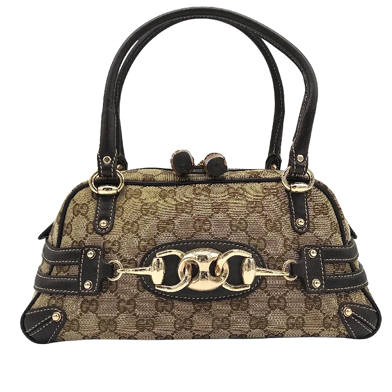 Women Gucci crossbody bags with a woven leather strapVintage Gucci Handle Bag