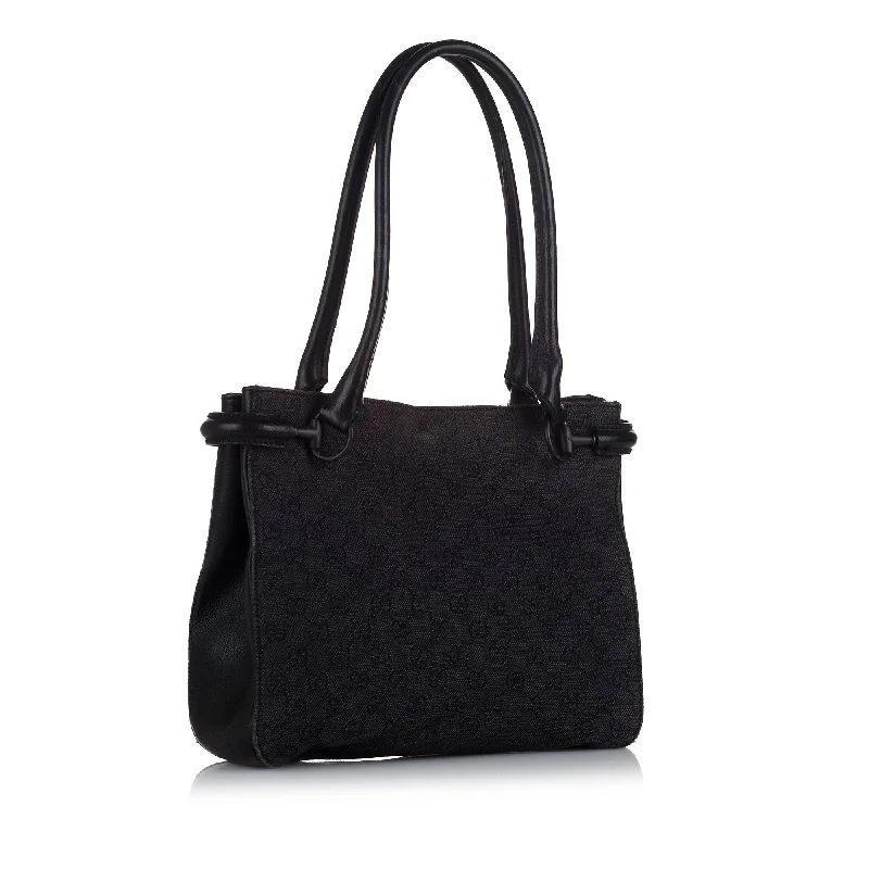 Women Gucci bags with a front - flap pocket for quick - access itemsBlack Gucci GG Canvas Tote Bag