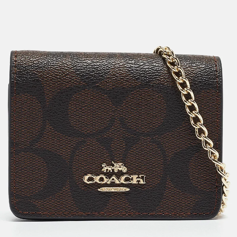 Coach Tabby bags with a classic turnlock closure for a timeless styleBlack/Brown Signature Coated Canvas and Leather Mini Chain Card Case