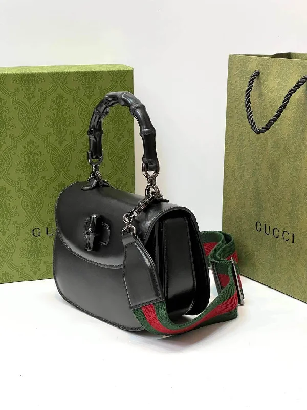 Women Gucci Sylvie bags with a leather - wrapped handleGucci Bamboo 1947 mini top handle bag black