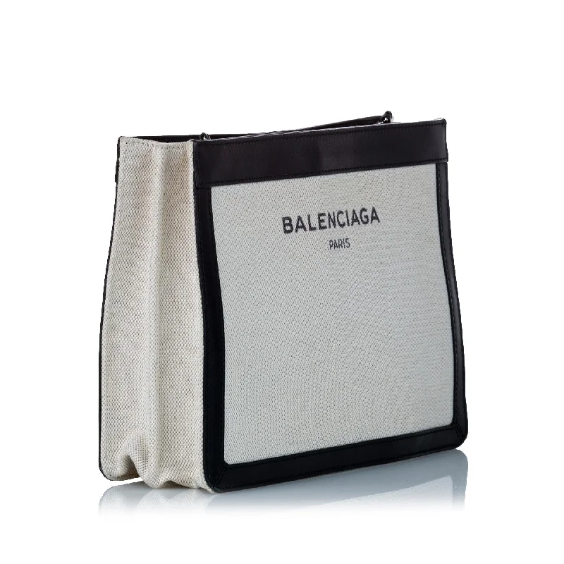 Balenciaga City bag with patchwork of different leathersBalenciaga Navy Pochette Canvas Crossbody Bag (SHG-30034)