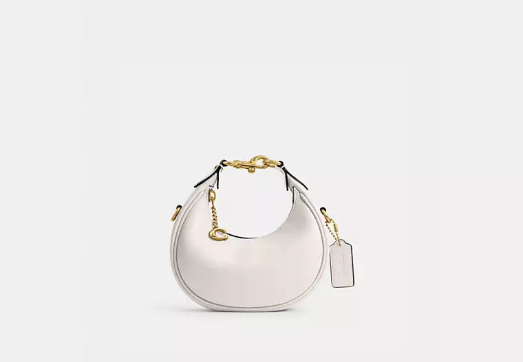 Coach bags with a patent - leather finish for a shiny and sophisticated appearanceCoach Jonnie Shoulder Bag White