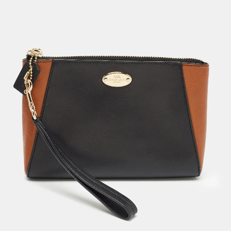 Ladies Coach Rogue bags with a star - shaped charm for a playful touchBlack/Brown Leather Morgan Wristlet Clutch