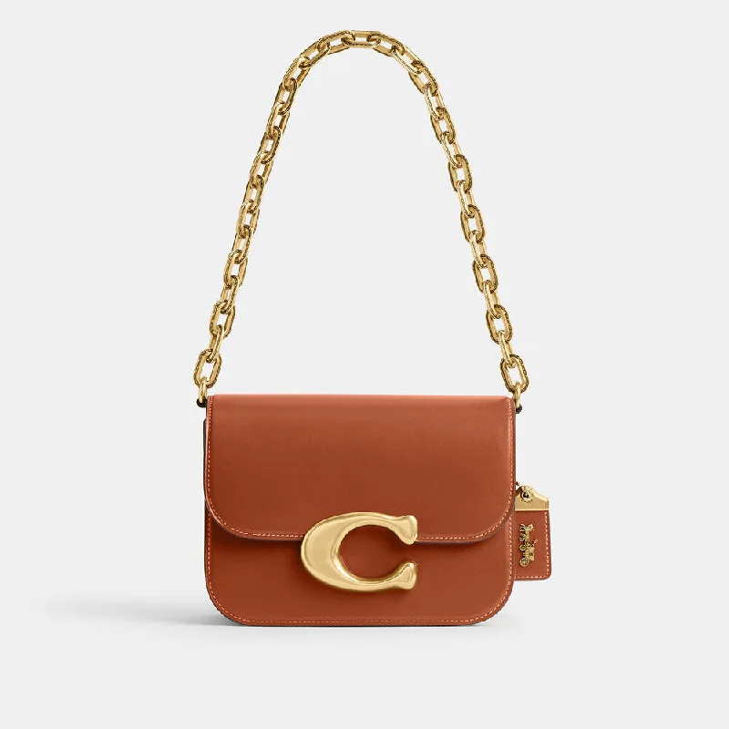 Coach Borough bags with a structured silhouette and a magnetic - snap closureCoach Idol Bag Burnished Amber