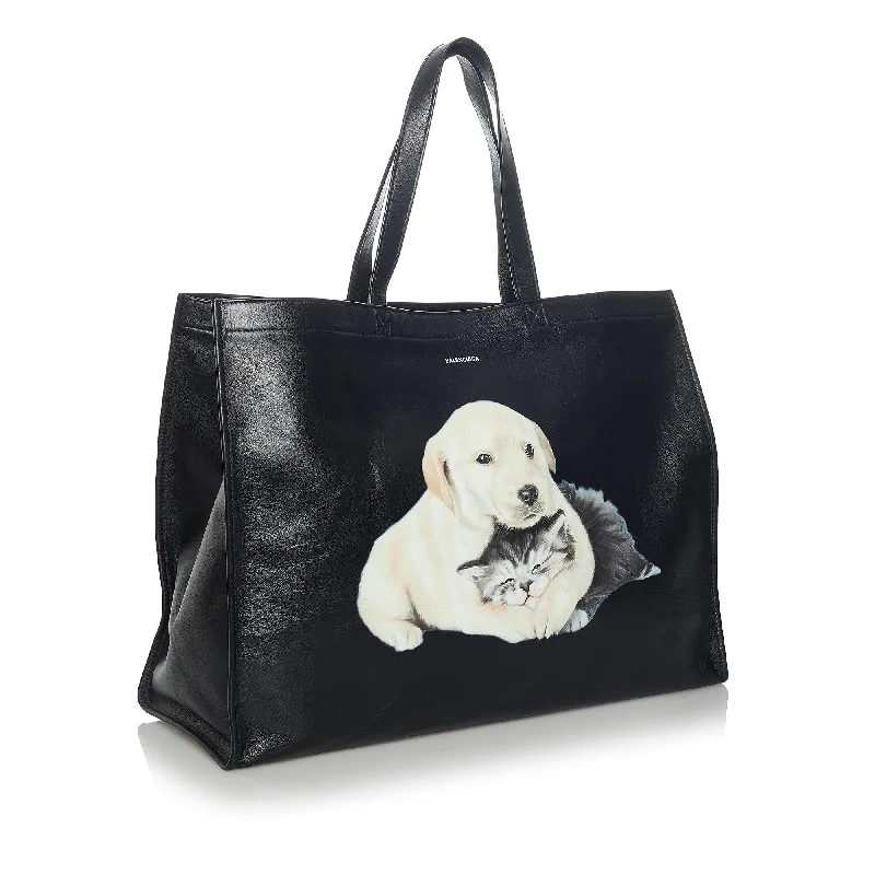 Balenciaga Le Cagole small size with stud - adorned frontBalenciaga Medium Puppy and Kitten Leather Tote Bag (SHG-35044)