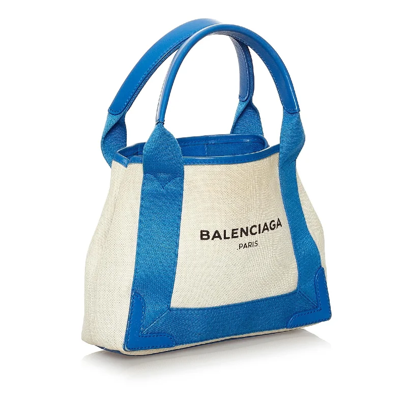 Balenciaga Le Cagole medium size with chain - linked sidesBalenciaga Navy Cabas XS Canvas Satchel (SHG-33098)