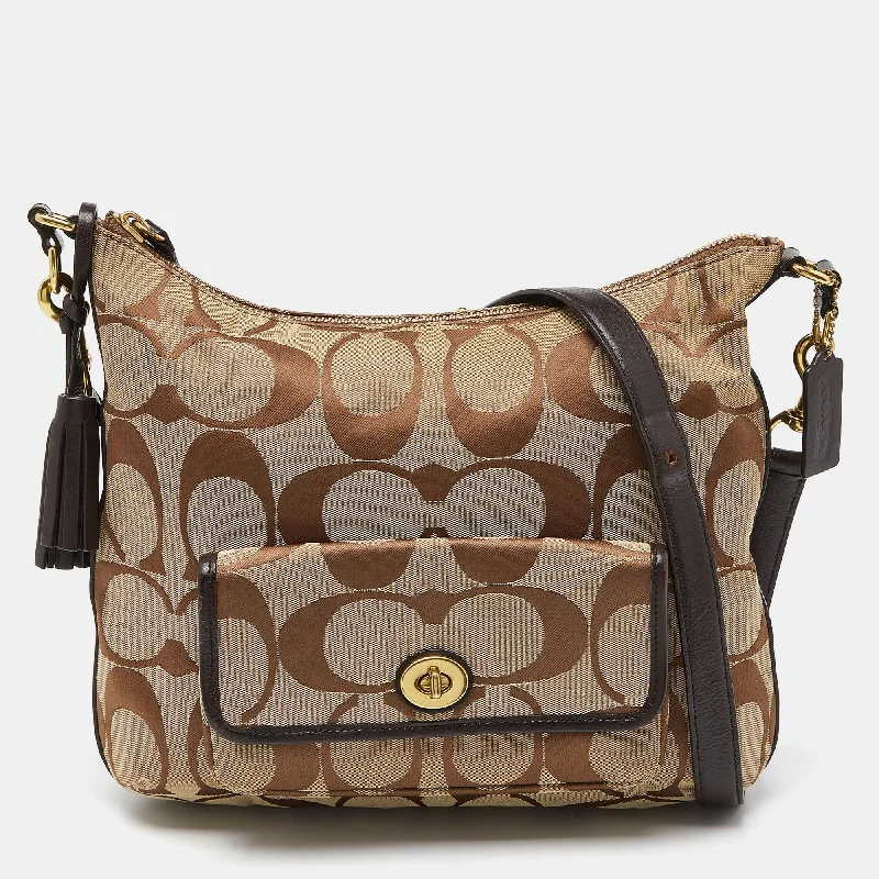 Coach Dempsey bags with a contrast - colored interior for visual interestBeige/Brown Signature Canvas and Leather Courtenay Crossbody Bag