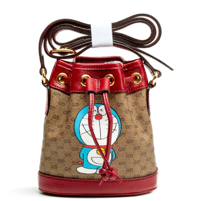 Gucci Marmont bags for women with a contrast - colored interiorGUCCI x Doreamon Candy GG Mini Bucket Bag