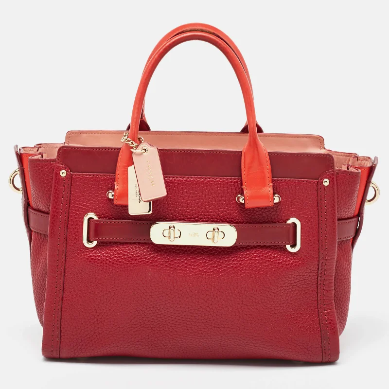 Coach backpacks with a hidden back pocket for securityTwo Tone Red Leather Swagger 27 Carryall Tote