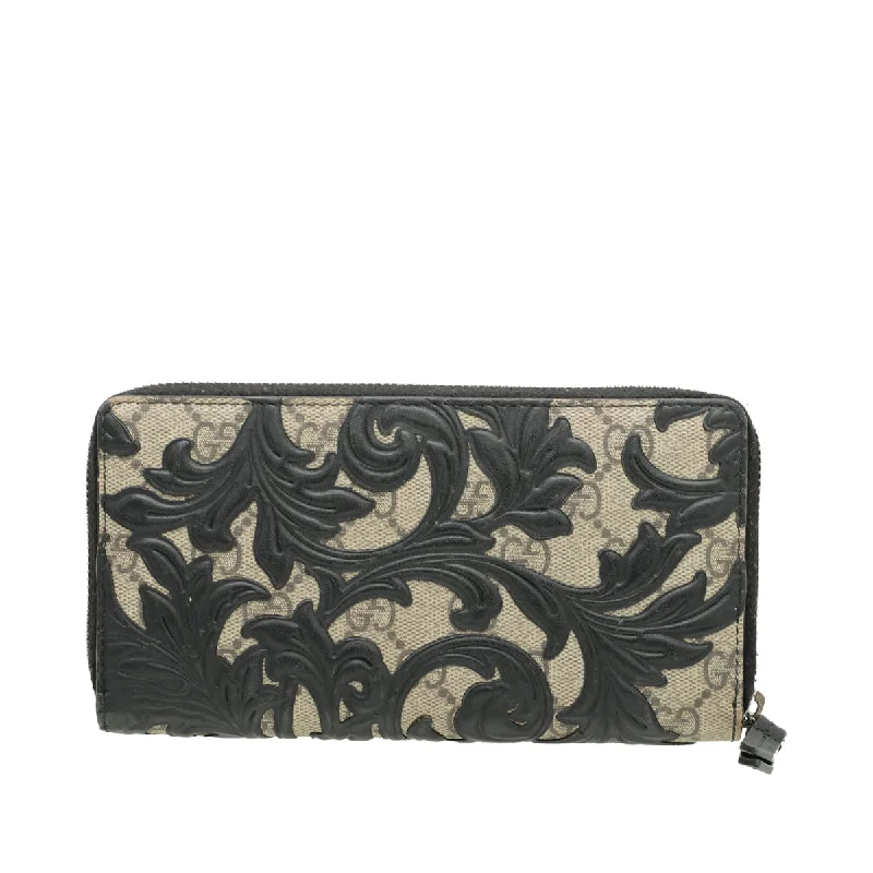 Gucci Marmont bags for women with gold - toned hardwareGucci Bicolor GG Supreme Arabesque Zip Wallet