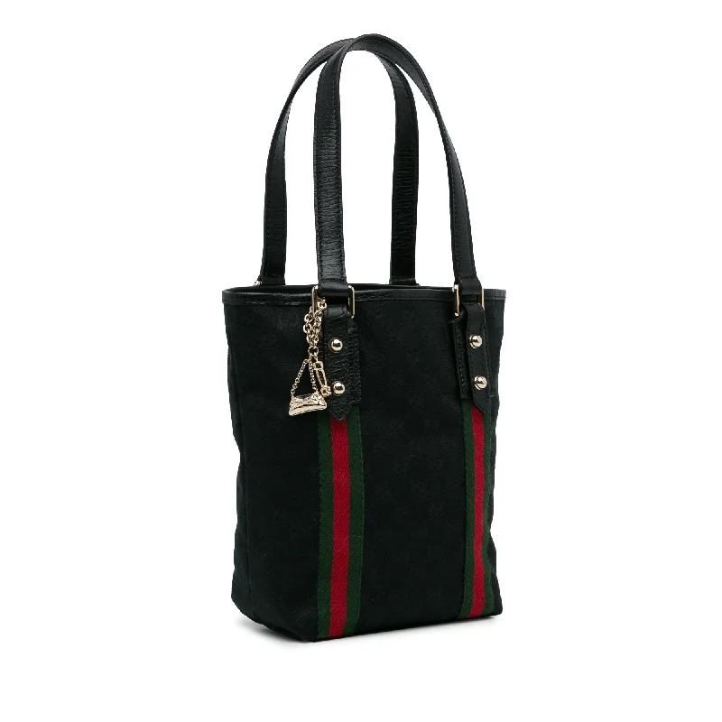 Ladies Gucci shoulder bags with a tassel decorationBlack Gucci GG Canvas Jolicoeur Tote Bag