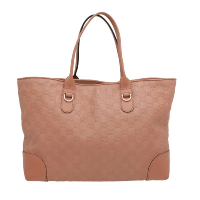 Gucci handbags for women with a beaded trimGucci Rose Beige Guccissima Heart Bit Charm Tote Bag