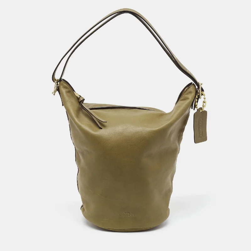 Coach Dempsey bags with a contrast - colored interior for visual interestOlive Green Leather Bleecker Bucket Bag