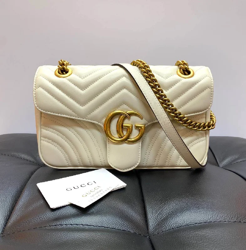 Gucci Marmont bags for women with a snakeskin - effect panelGucci GG Marmont small cross-body bag white