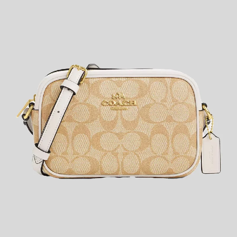 Coach bags with a zip - top closure and a front - pocket for quick accessCOACH Mini Jamie Camera Bag In Signature Canvas Light Khaki/Chalk CQ874