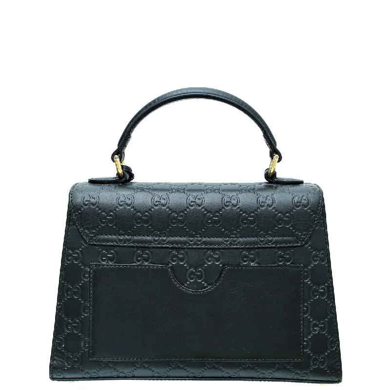 Women Gucci Sylvie bags with a monogram - embossed leatherGucci Black Guccissima Padlock Top Handle Small Bag