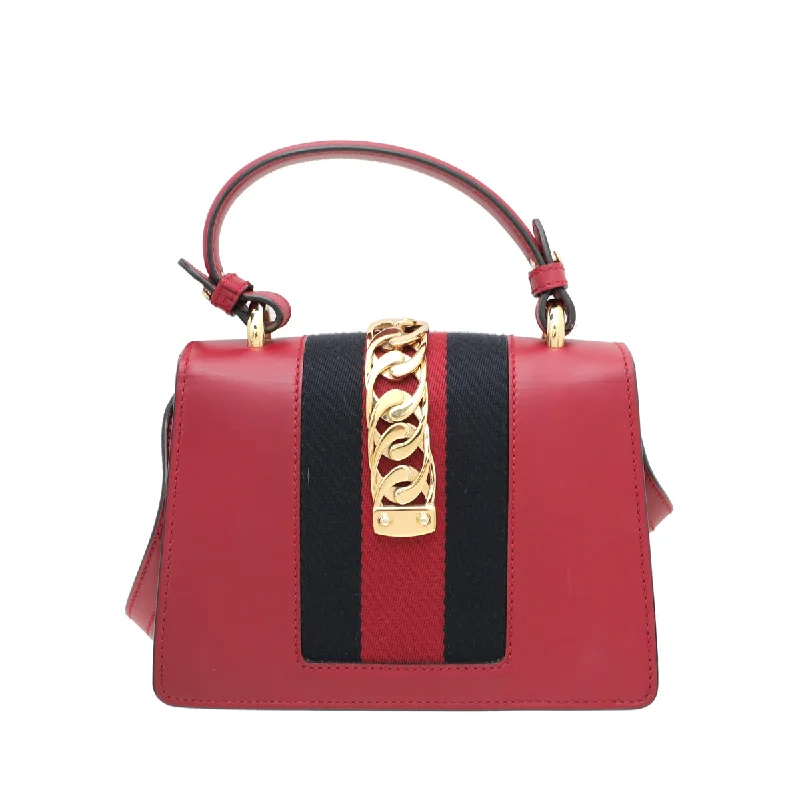 Women Gucci bags with a chain - link trim and a leather bodyGucci Red Sylvie Top Handle Mini Bag