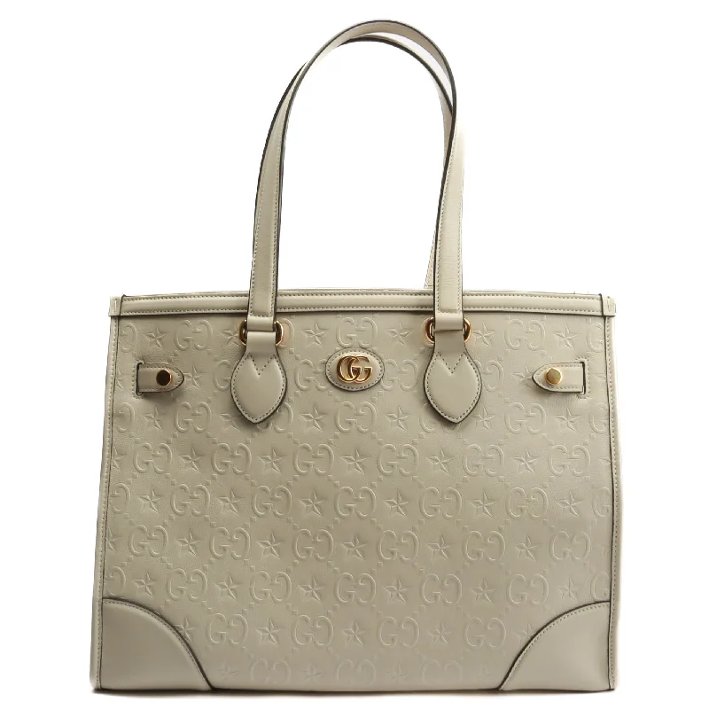 Gucci backpacks for women with a padded laptop compartmentGUCCI GG Star Embossed Medium Tote w/Pouch - Ivory