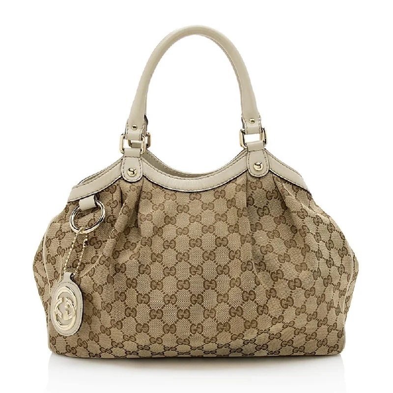 Ladies Gucci shoulder bags with a tassel decorationGucci GG Canvas Sukey Medium Tote (SHF-12411)