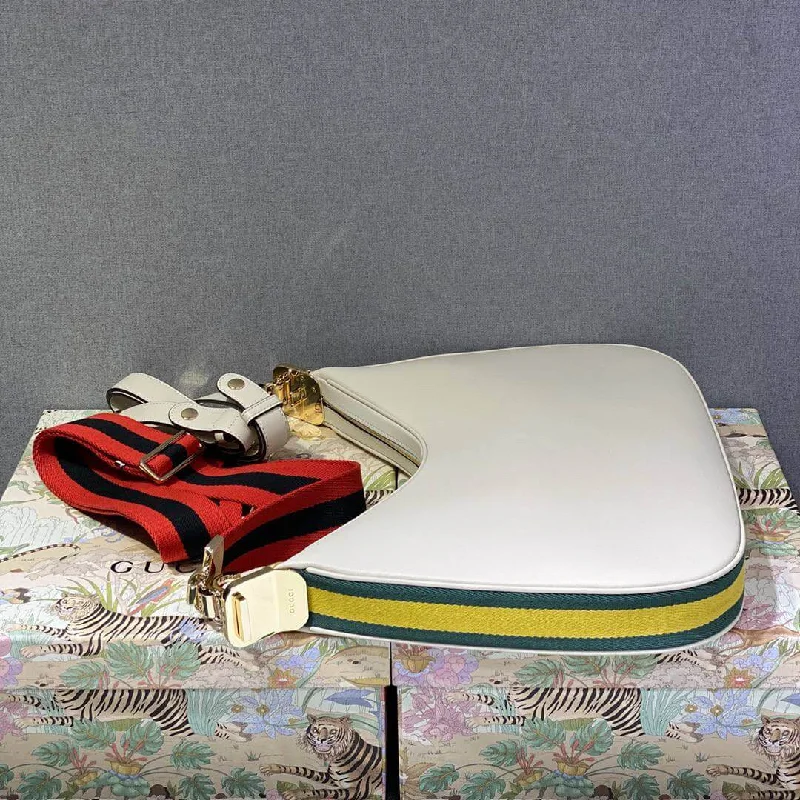 Women Gucci Sylvie bags with a leather - wrapped handleGucci Attache small shoulder bag White leather