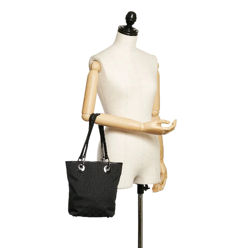 Women Gucci Sylvie bags with a detachable ribbon detailBlack Gucci GG Canvas Eclipse Tote Bag