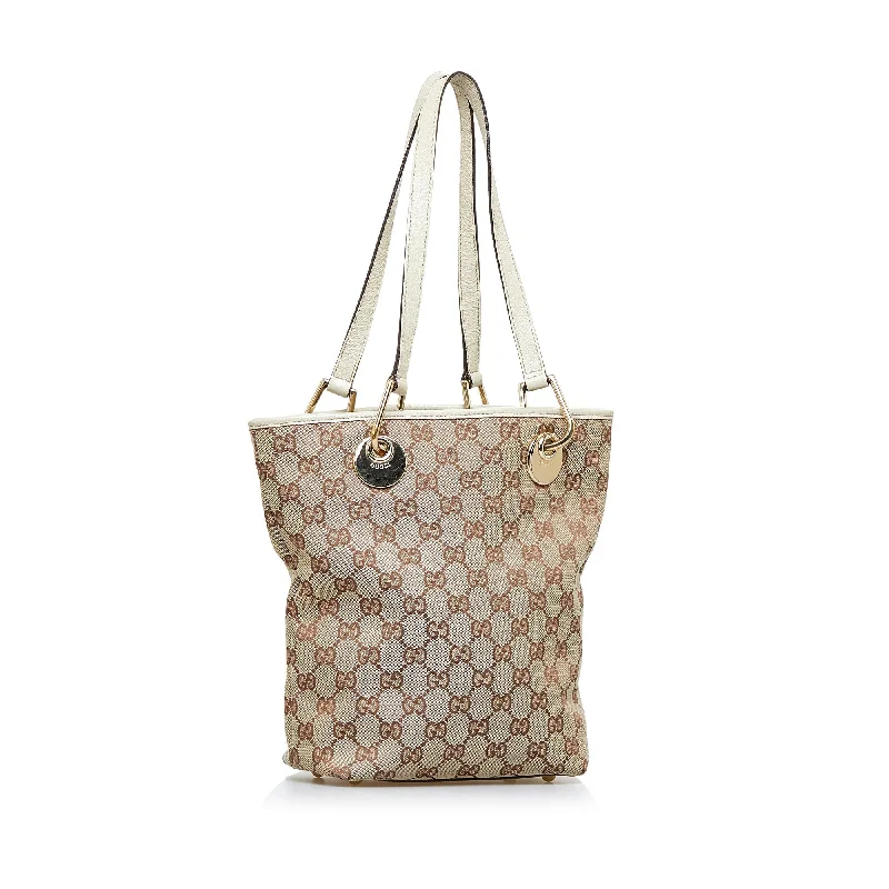 Gucci handbags for women with a patent - leather finishBrown Gucci GG Canvas Eclipse Tote Bag