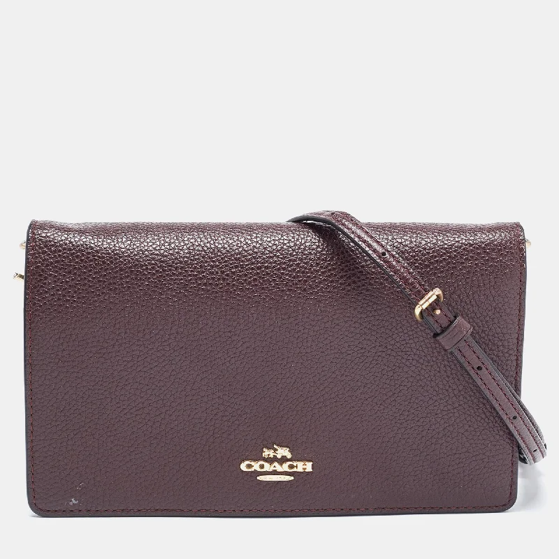 Coach Borough bags with a removable interior organizerDark Brown Pebbled Leather Hayden Foldover Clutch Bag