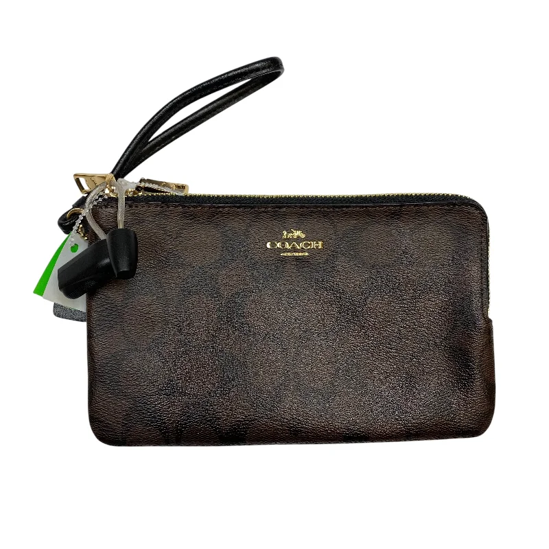 Coach handbags with a beaded trim for a glamorous and elegant lookWristlet Designer By Coach, Size: Large