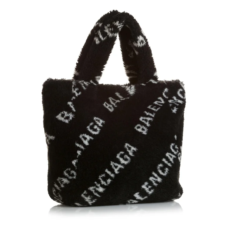 Balenciaga Speed small size with embossed logo on the sideBalenciaga Logo Faux Fur Everyday XS Tote (SHG-35216)