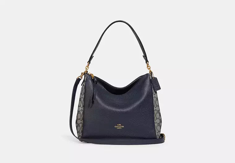 Ladies Coach Tabby bags with a textured leather surface for a more tactile lookCoach Signature Jacquard Shay Leather Shoulder Bag Handbag Purse Navy Blue NEW