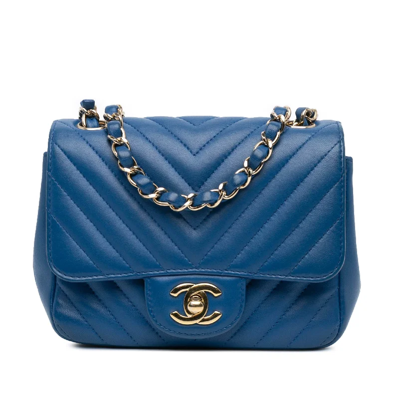 Balenciaga Le Cagole small size with stud - adorned frontBlue Chanel Mini Square Classic Chevron Lambskin Single Flap Crossbody Bag