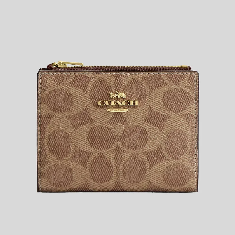 Coach Borough bags with a contrast - stitched handle for a unique lookCOACH Bifold Wallet In Signature Canvas Tan/Brown CW803