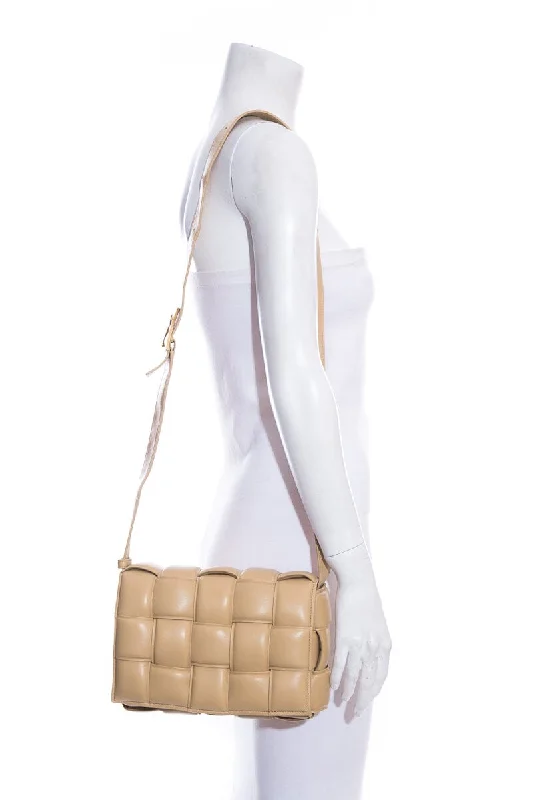 Bottega Veneta bags with leather - wrapped handlesBottega Veneta Nude Cassette Handbag