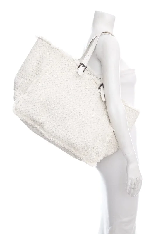 Bottega Veneta bags with beaded embellishmentsBottega Veneta White Intrecciato Fringe Tote